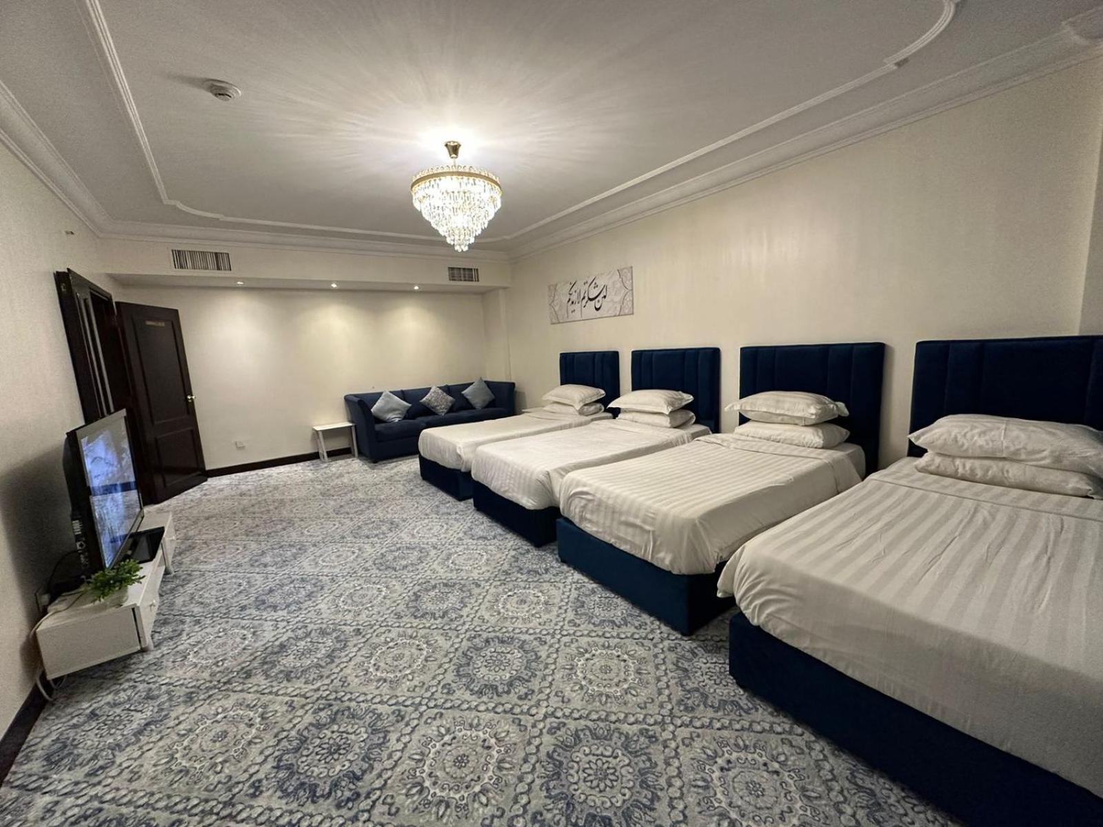 Zad Al Eman Suites Hotels Медина Номер фото