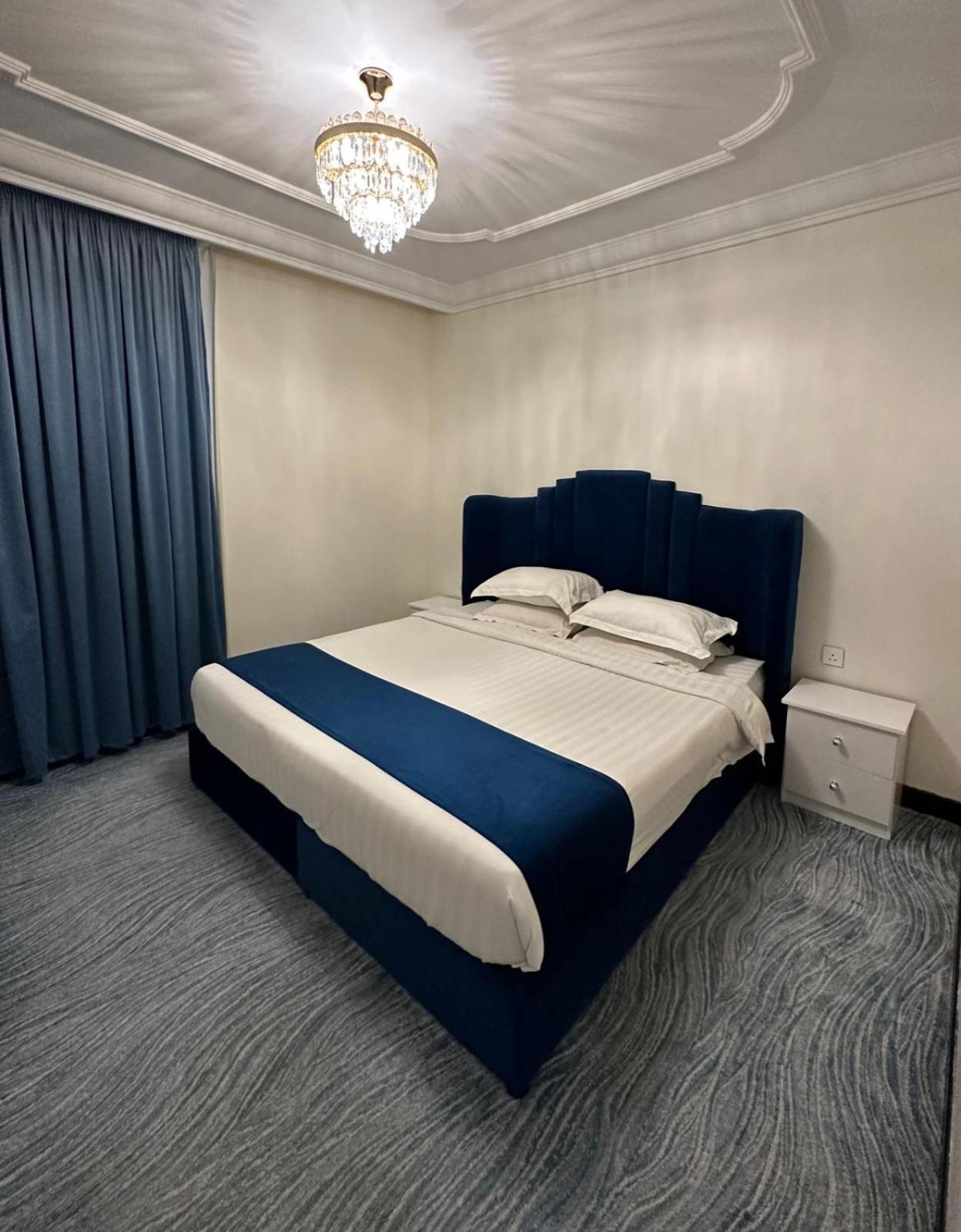 Zad Al Eman Suites Hotels Медина Номер фото