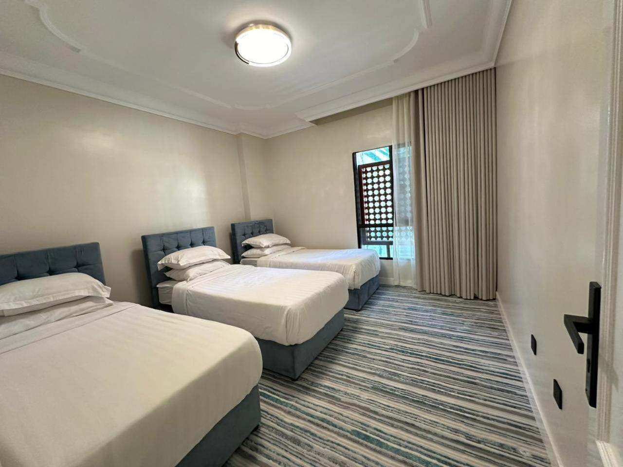 Zad Al Eman Suites Hotels Медина Номер фото