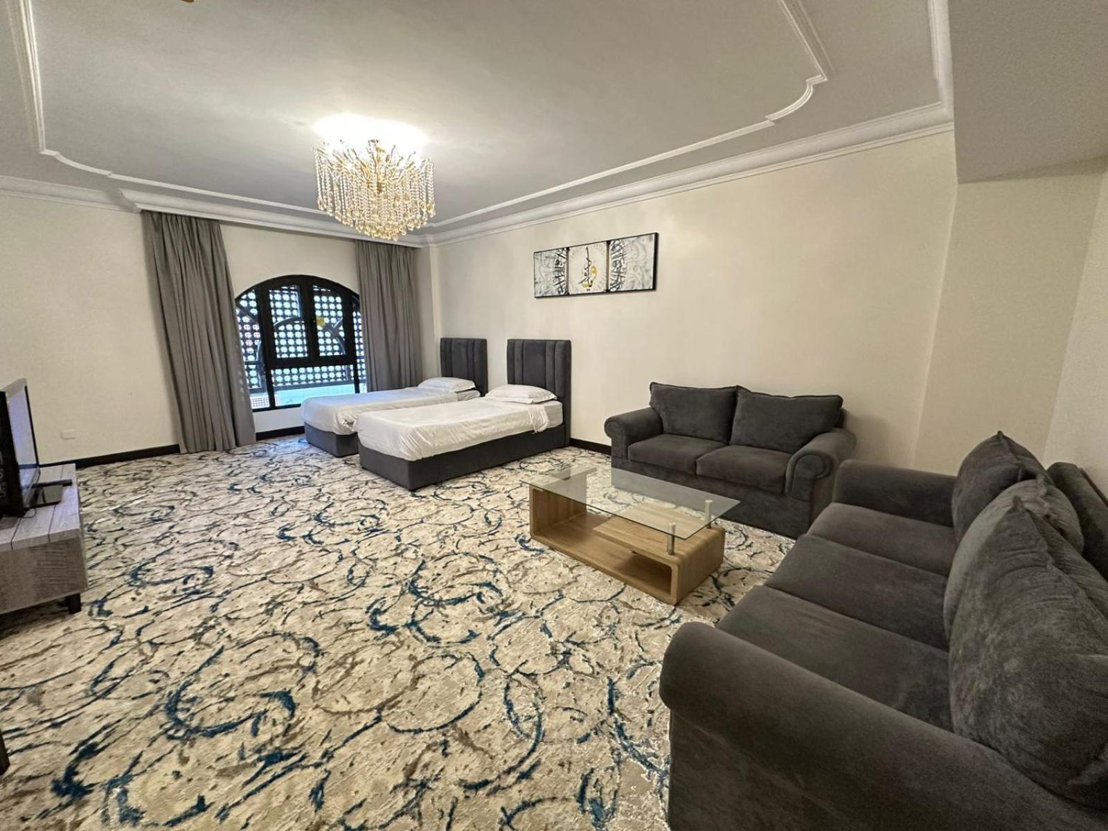 Zad Al Eman Suites Hotels Медина Номер фото