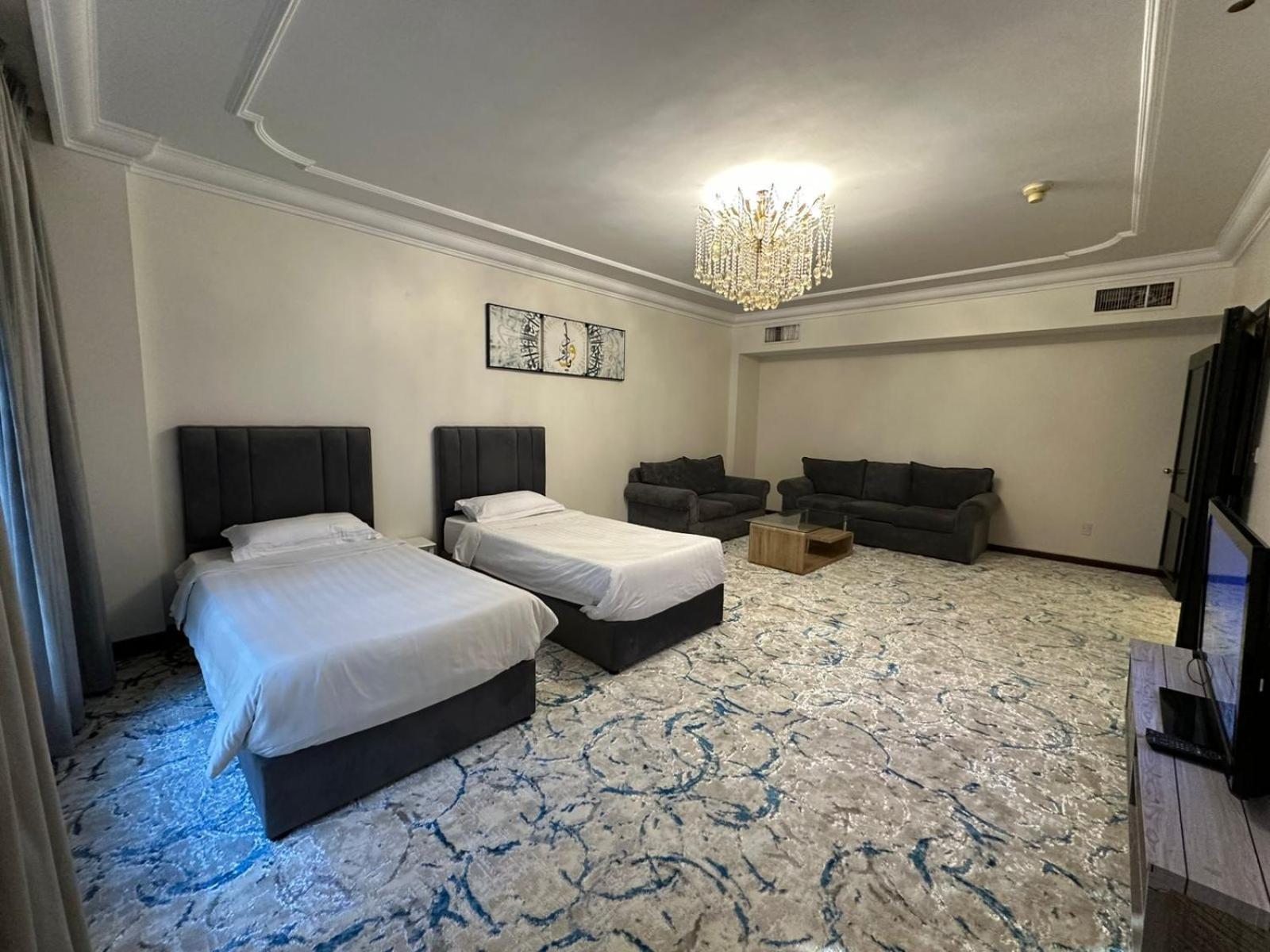 Zad Al Eman Suites Hotels Медина Номер фото